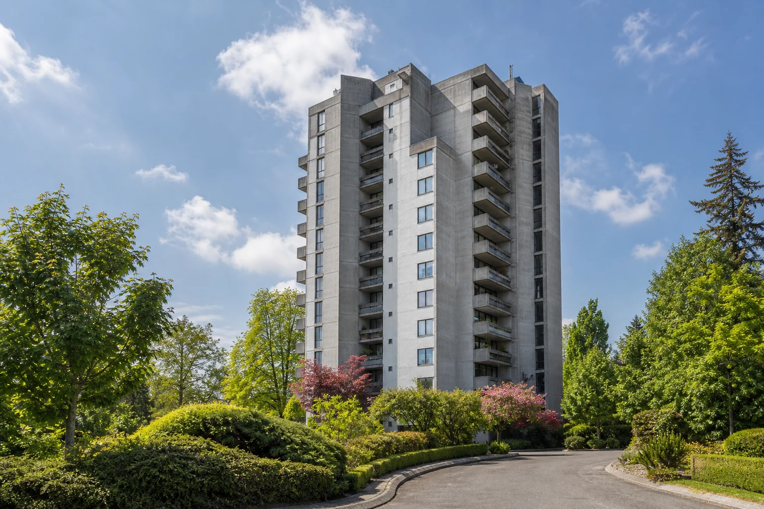 architectural promotional rendering of Kensington House at 6689 Willingdon Avenue showing its stepped exposed-concrete tower above mature gardens
